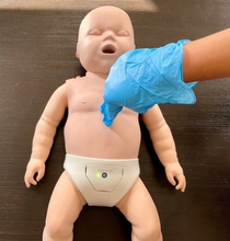 Adult CPR training demonstration